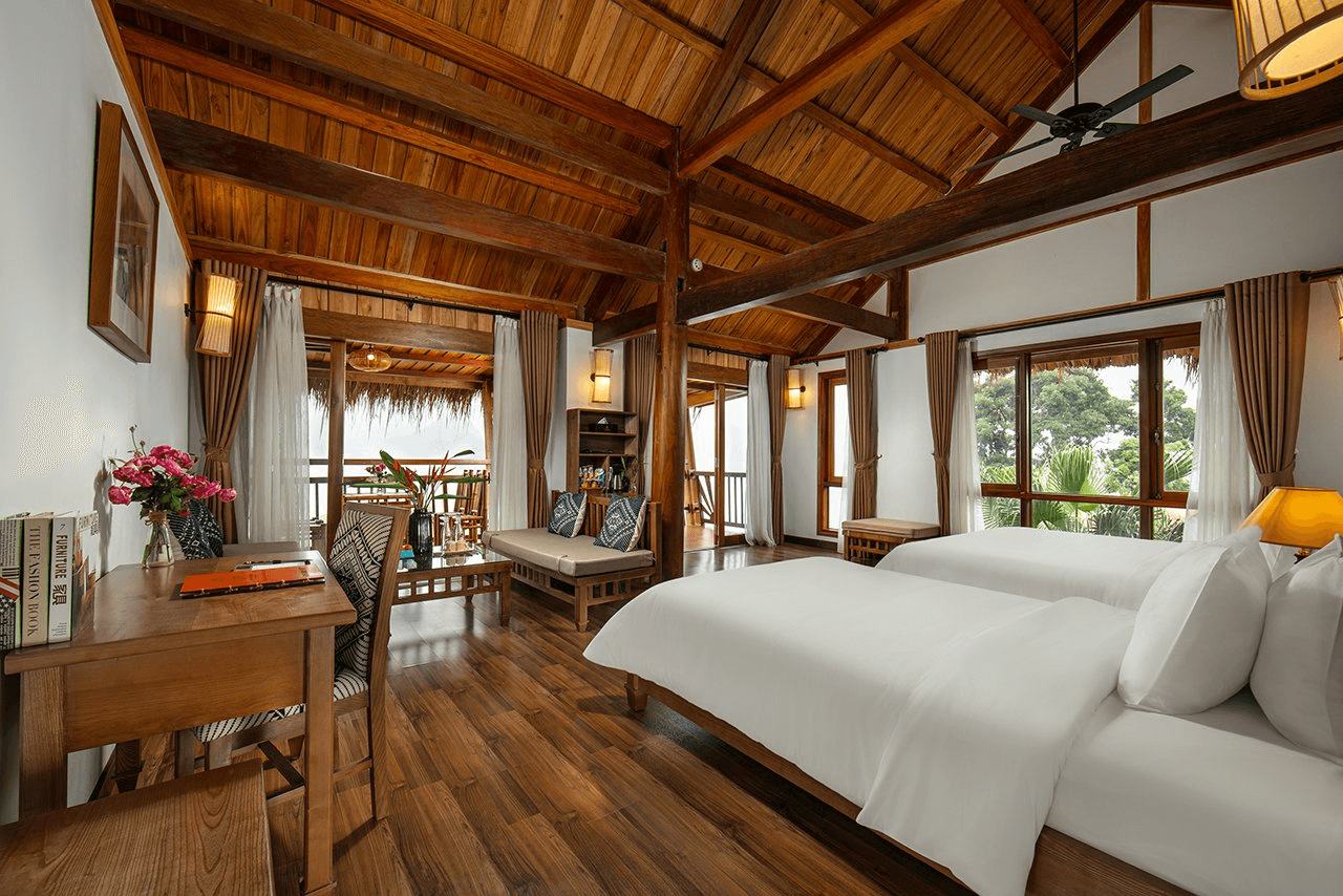 Phòng ngủ đầy đủ tiện nghi tại Mai Châu Hideaway Lake Resort