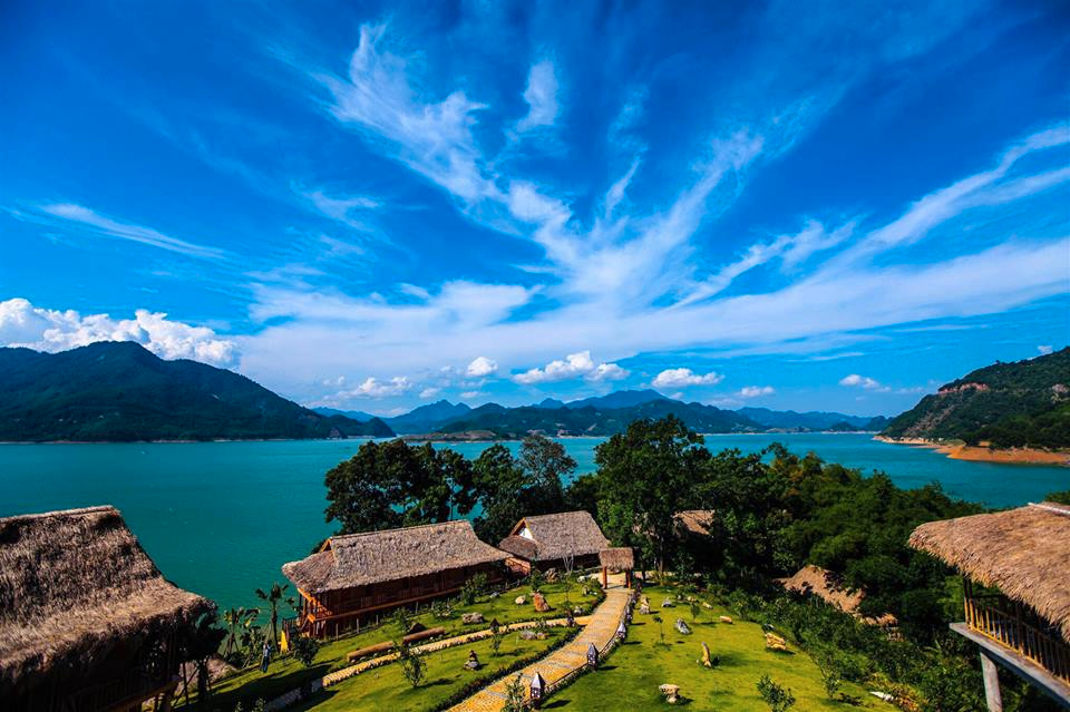 Mai Chau Hideaway Lakes Resort surrounded by Hoa Binh Lake and forested mountains