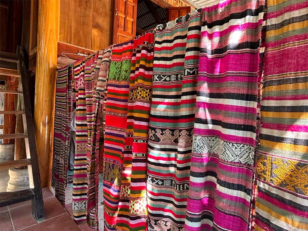 You can purchase unique handmade products directly from the villagers, including embroidered textiles